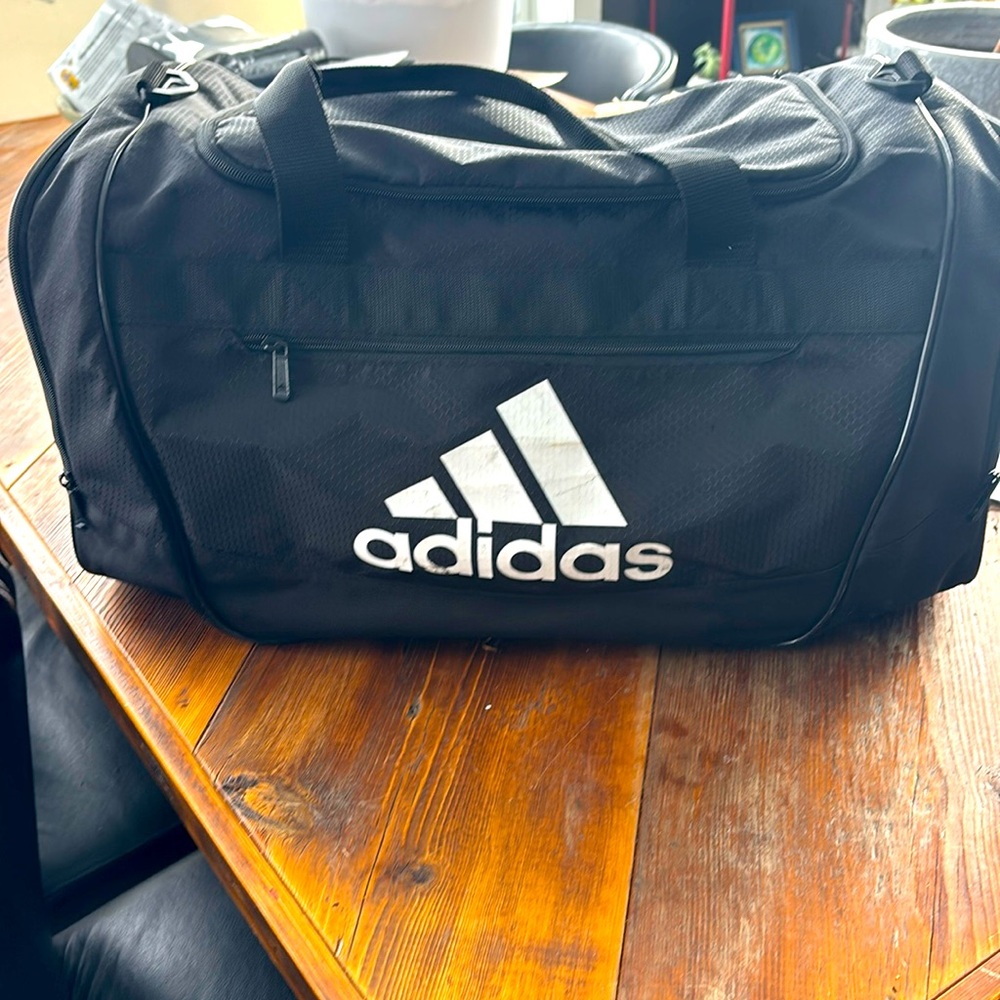 Adidas black duffel bag for sports